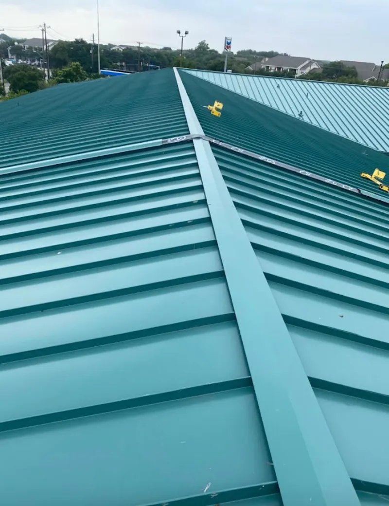 Green commercial metal roof ridge and valley for Metal Roof Repair in Edna